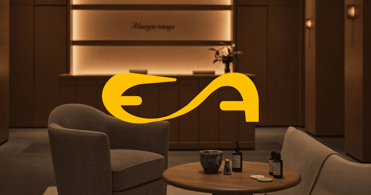 Ambiente de spa com toalhas e velas — preparação para sessão de massagem